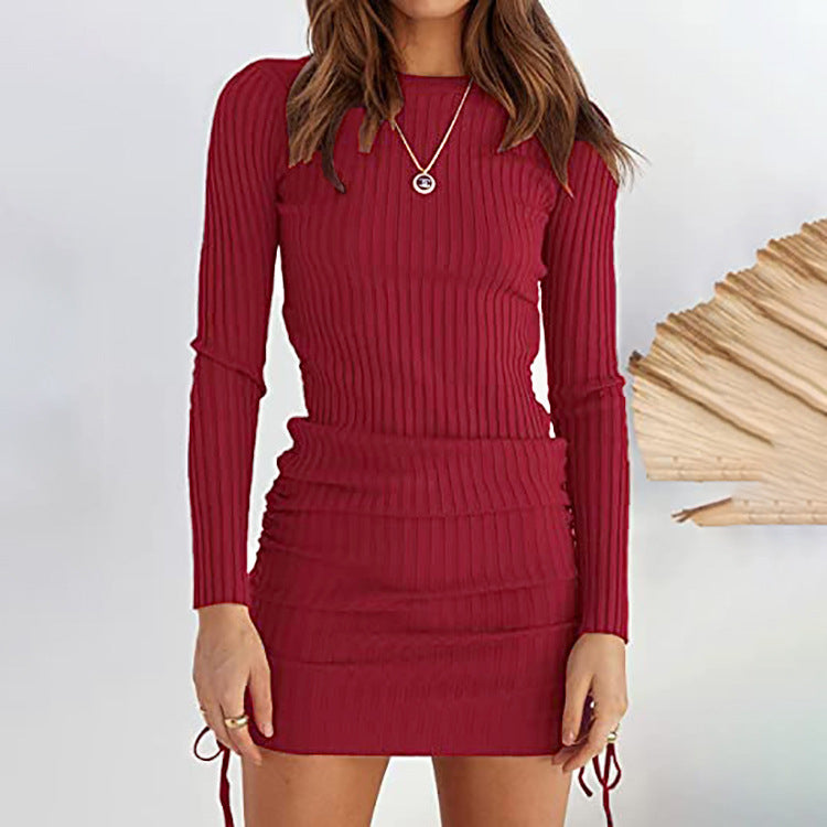 a woman wearing a red dress