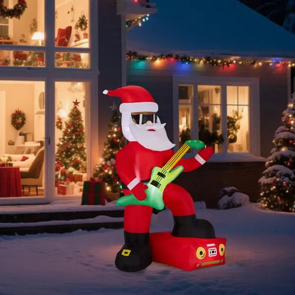a inflatable santa claus playing a guitar in front of a house