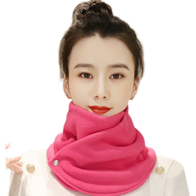 a woman with a scarf around her neck