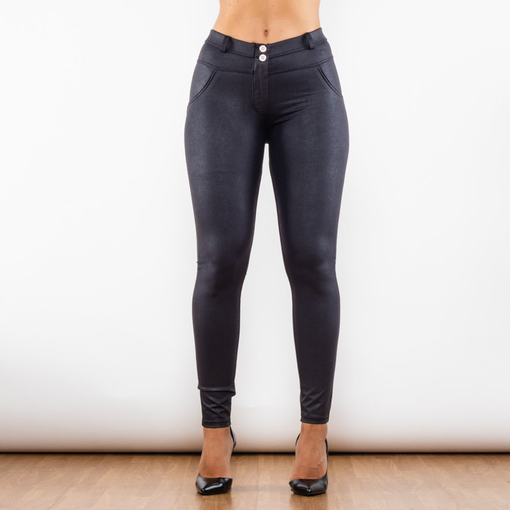 a woman's body in black tight pants