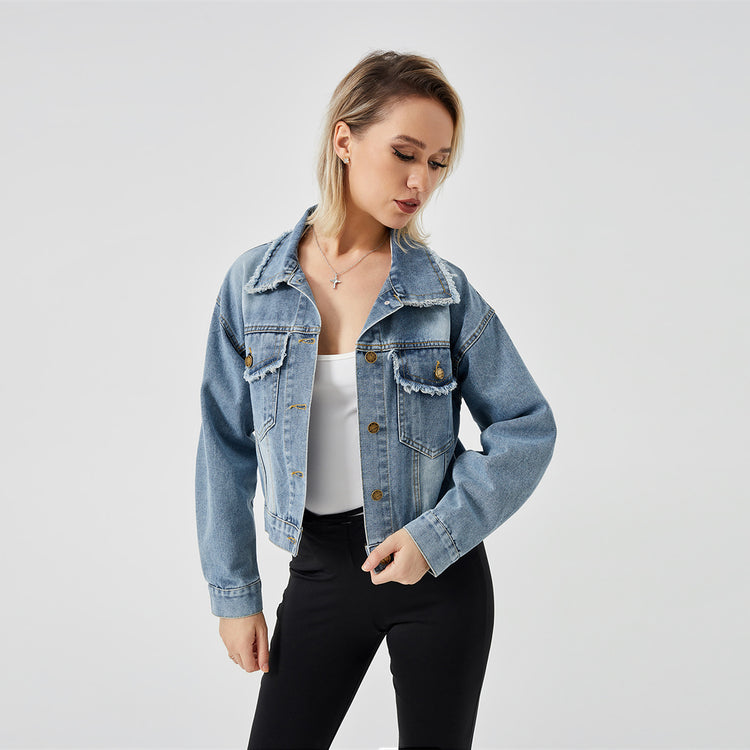 a woman in a denim jacket