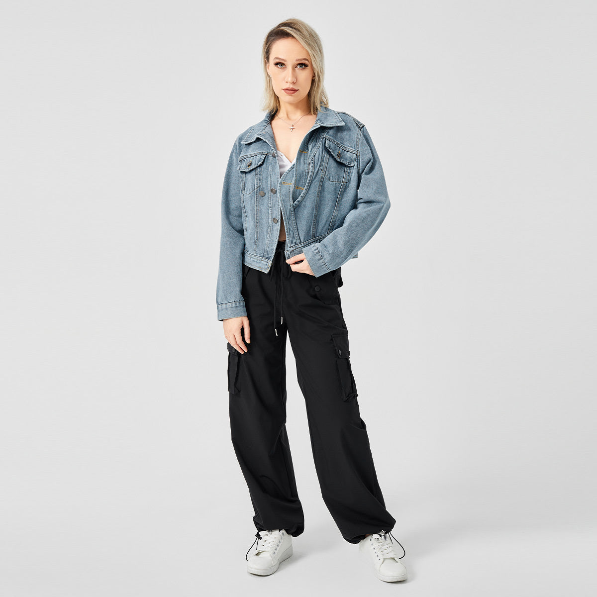 a woman in a denim jacket