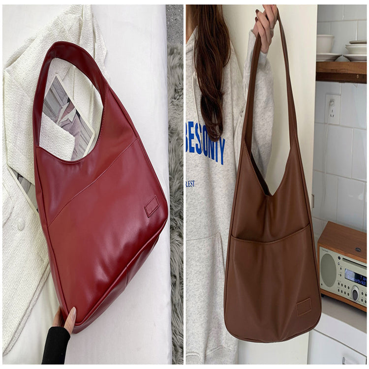 a red purse on a wall