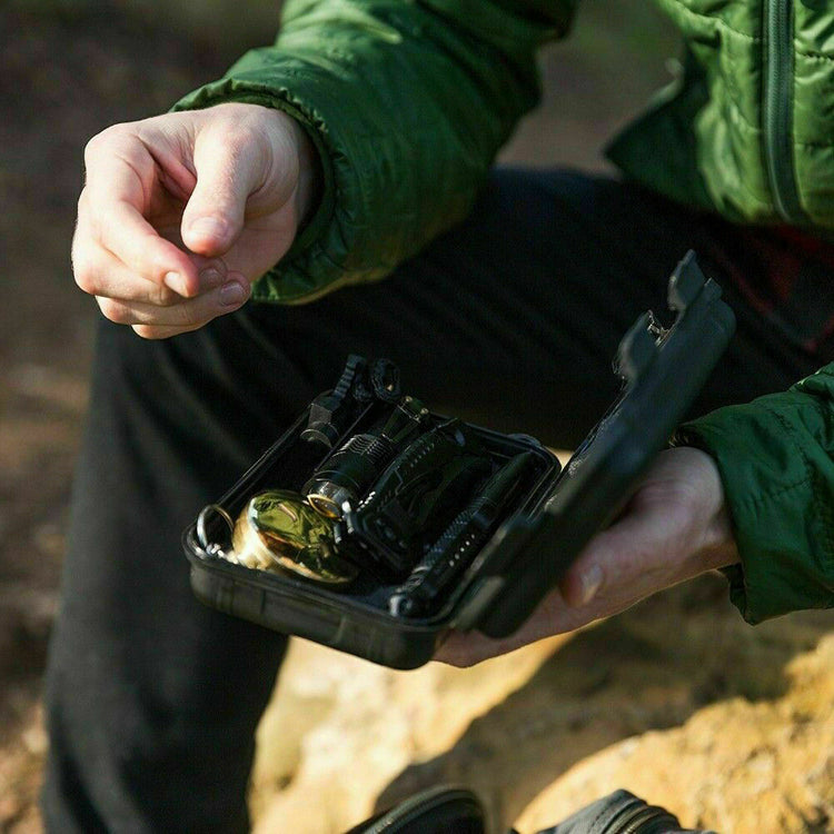 a person holding a small case with objects in it