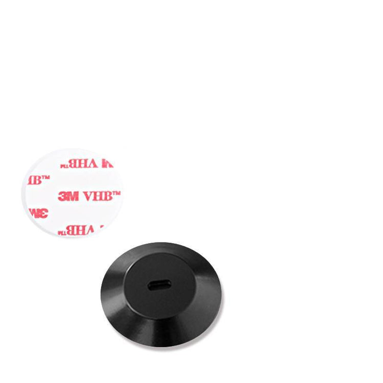 a black object with a hole in the middle
