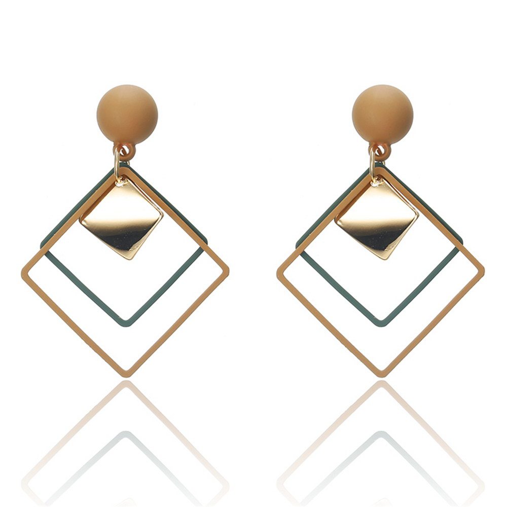 a pair of earrings with a square shape