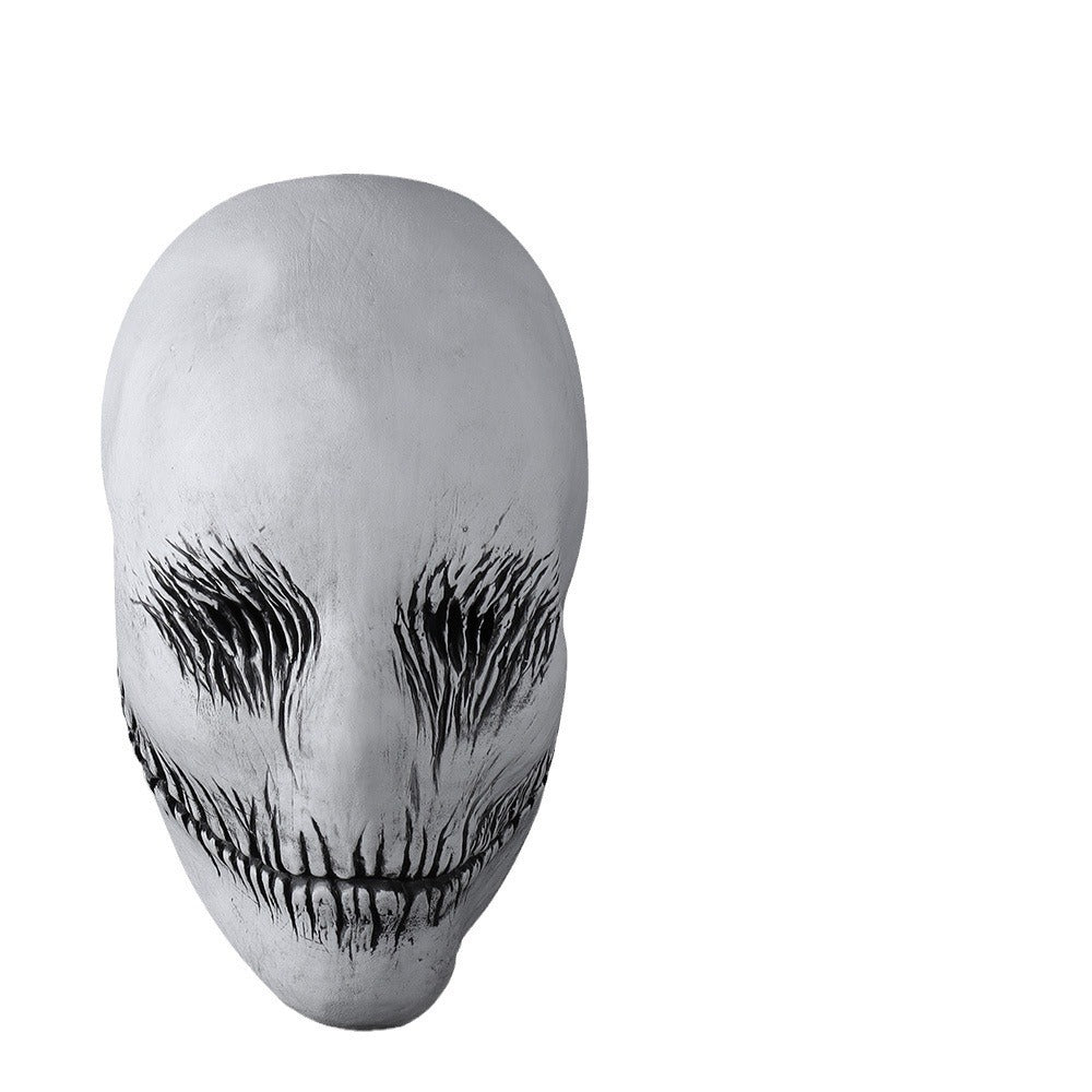 a white mask with black lines on it