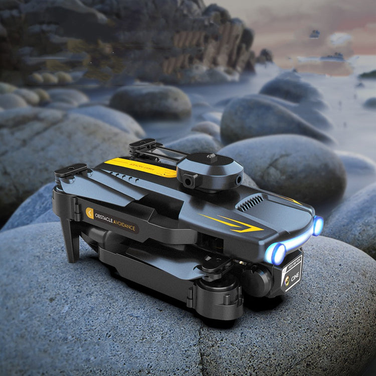 a black drone on rocks