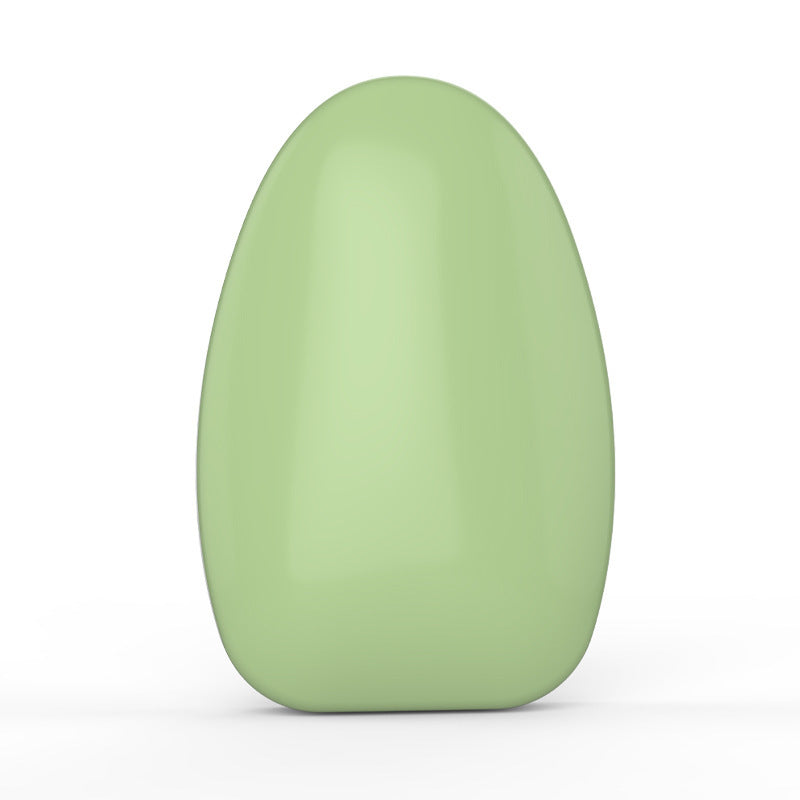 a green object on a white background