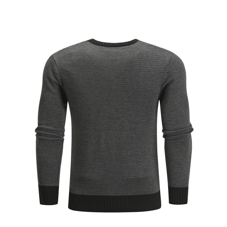 a black and grey sweater