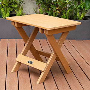 a small wooden table on a deck