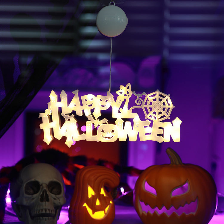 a group of pumpkins and skulls