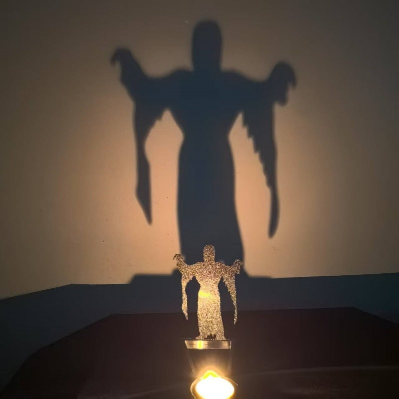 a shadow of a person on a wall