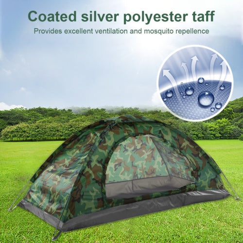 a tent on a grass field