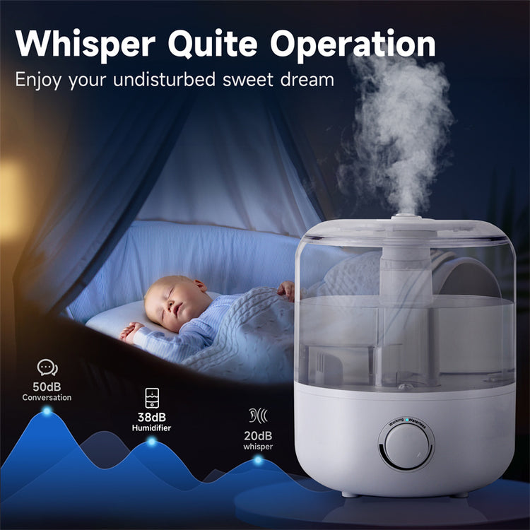 a baby sleeping in a bed with a humidifier