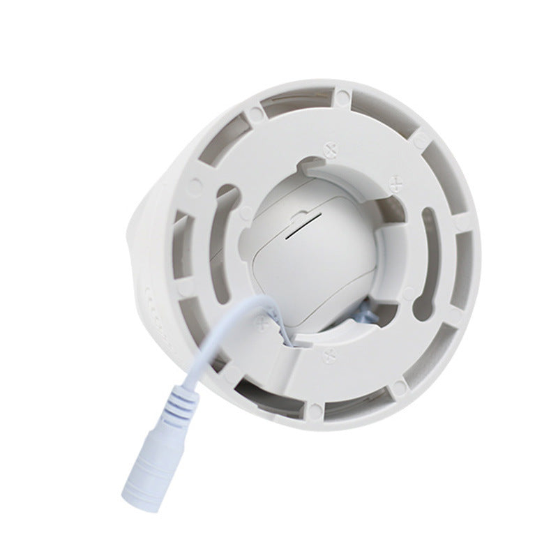 a white round object with a white cord