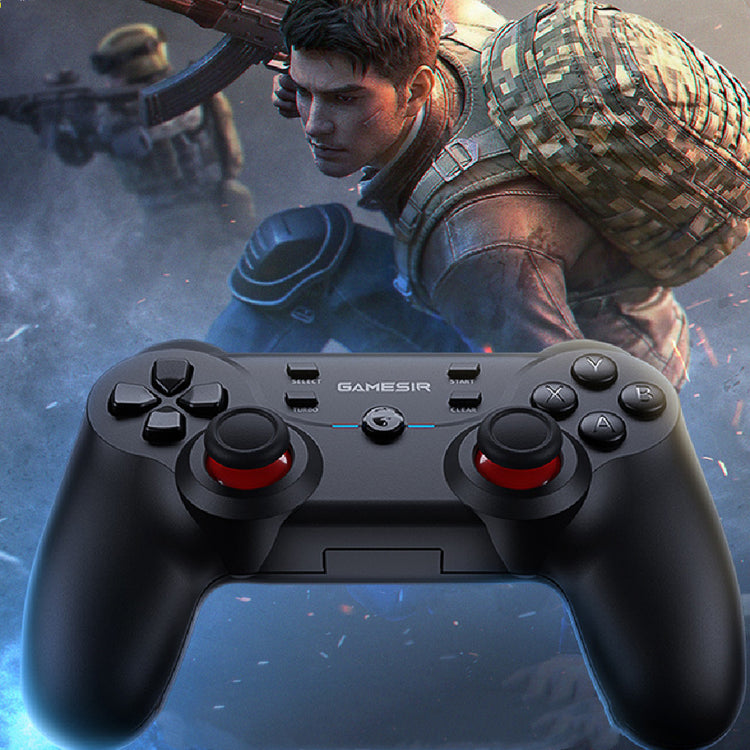 a video game controller with a man in the background