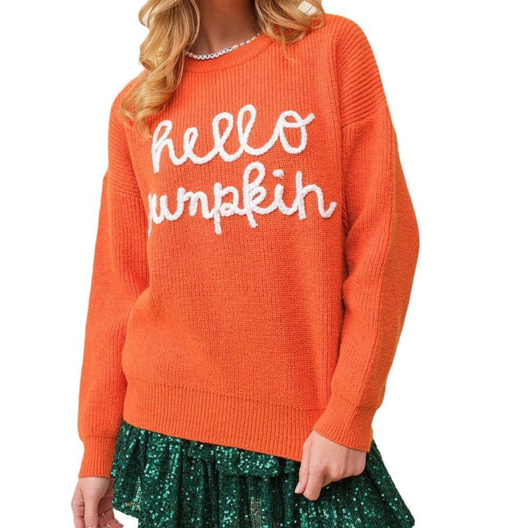 a woman in a sweater