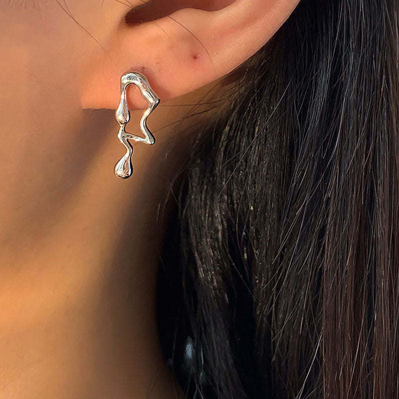 a close up of a woman's ear
