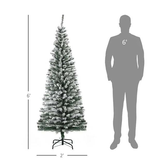 a tall artificial christmas tree with a man silhouette