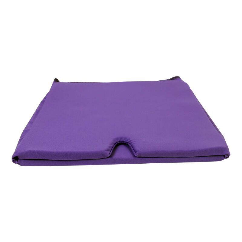 a purple cushion on a white background