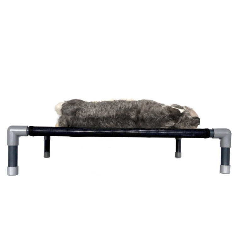 a dog lying on a metal frame