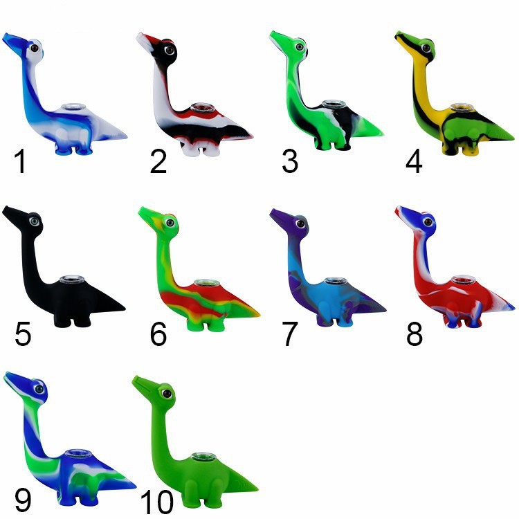 a collection of different colored dinosaur figurines