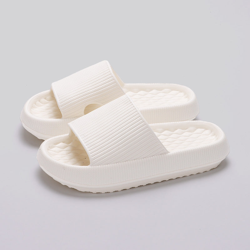 a pair of white slippers