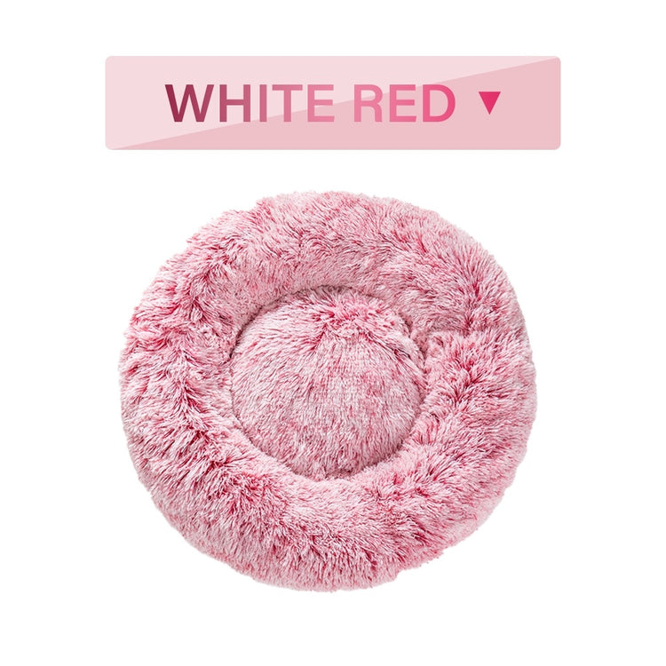 a pink fluffy pillow with text