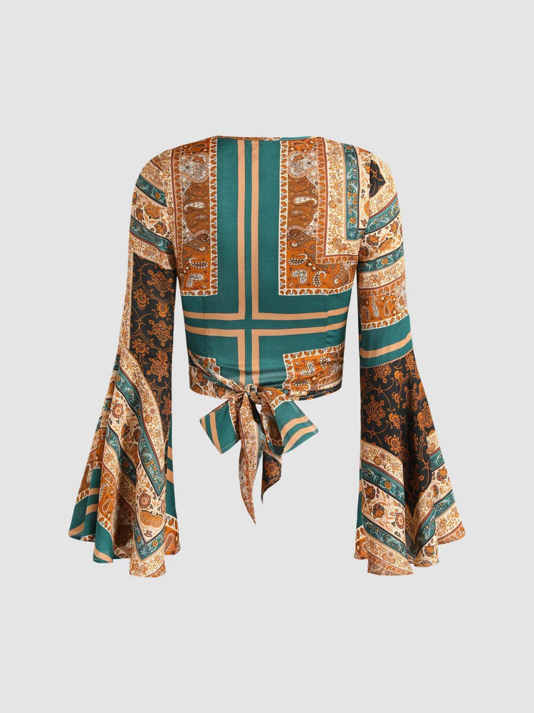 a green and orange patterned shirt