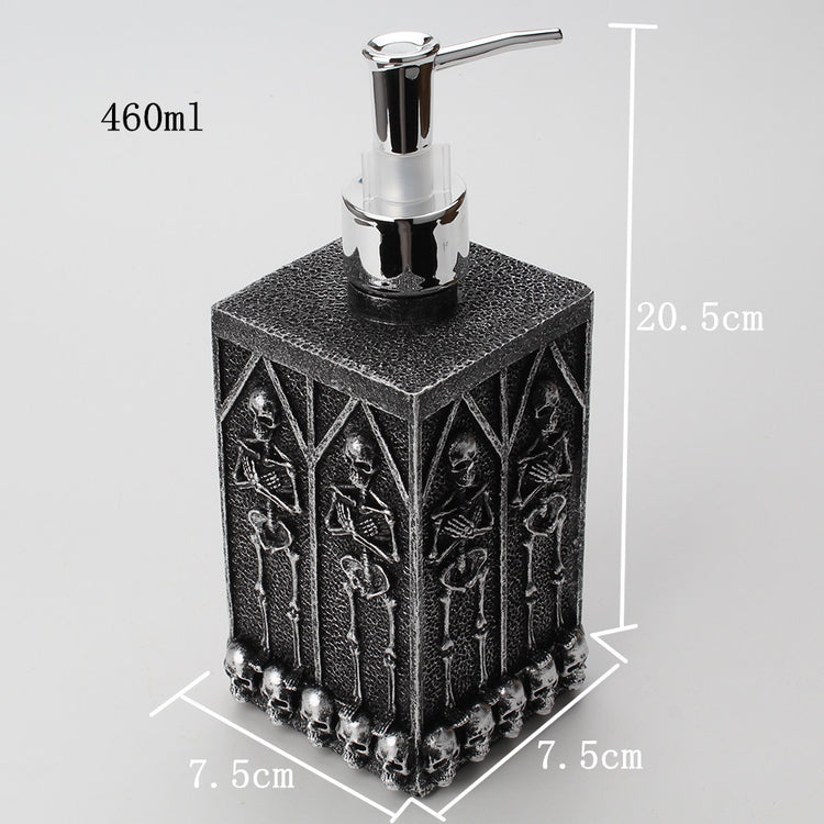 a black and silver soap dispenser with measurements