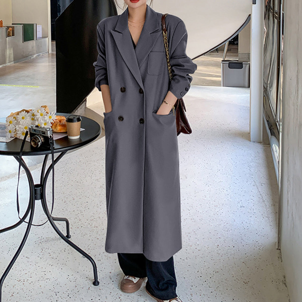 a woman standing in a hallway