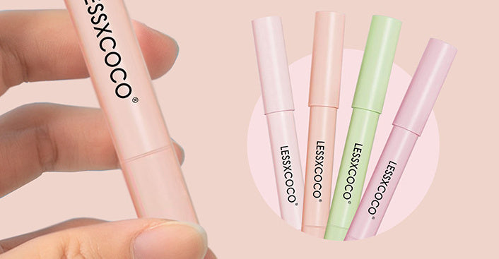 a hand holding a set of highlighters