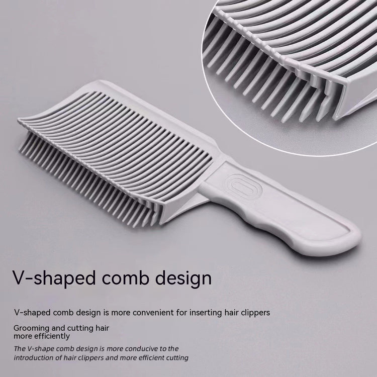 a comb with a white handle