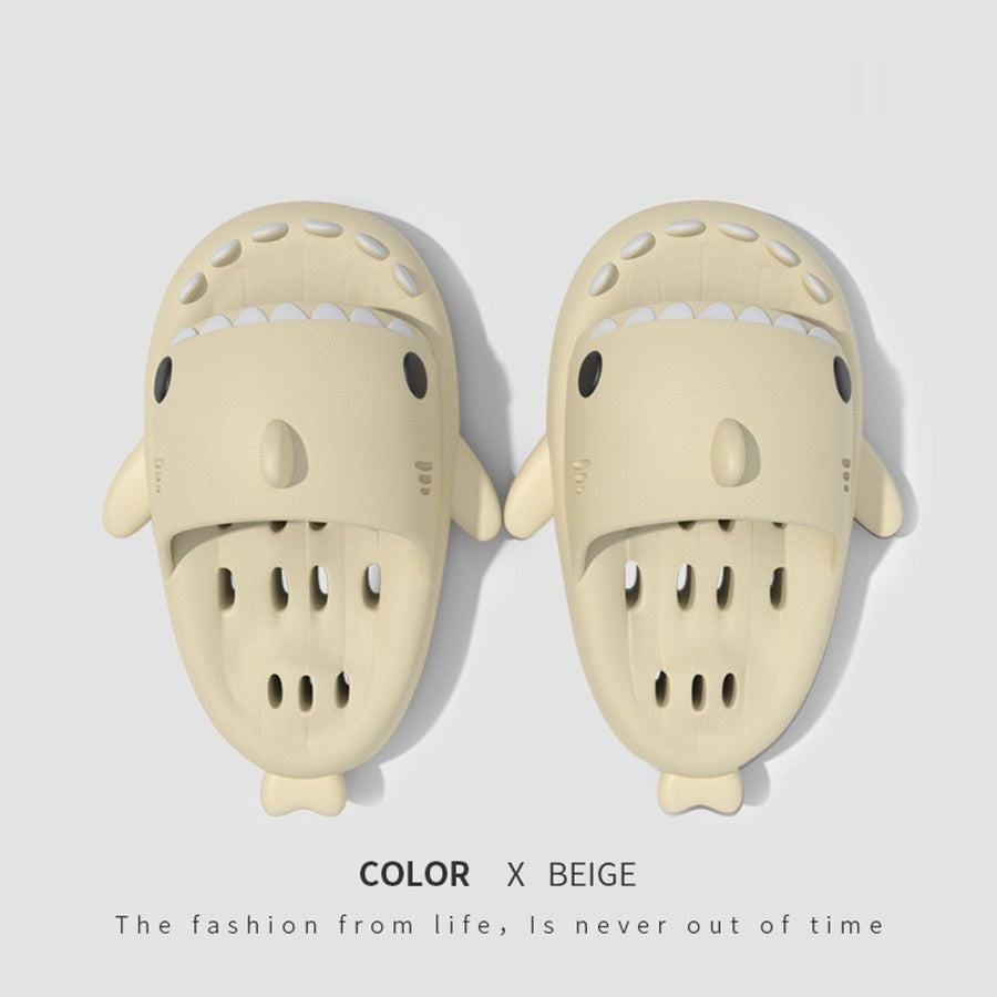 a pair of shoes with a cartoon shark face
