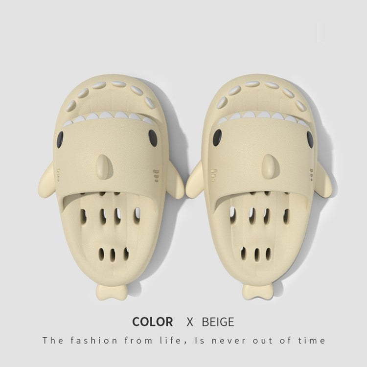a pair of shoes with a cartoon shark face