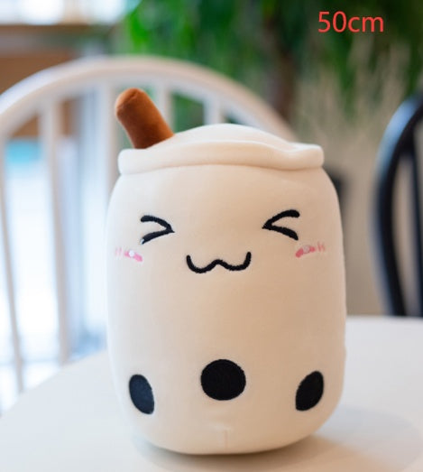 a white stuffed animal on a table