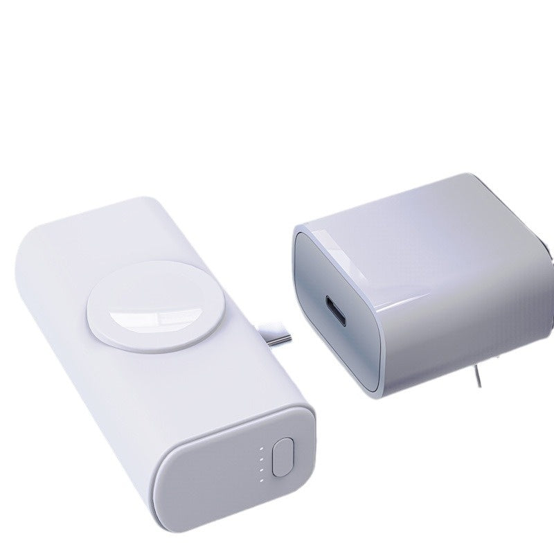a white rectangular object with a round button