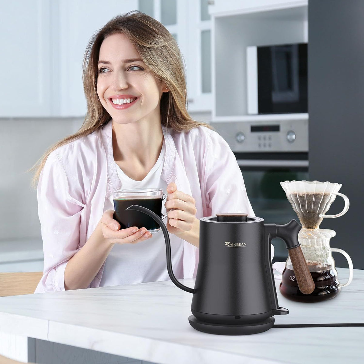 a woman holding a cup of coffee