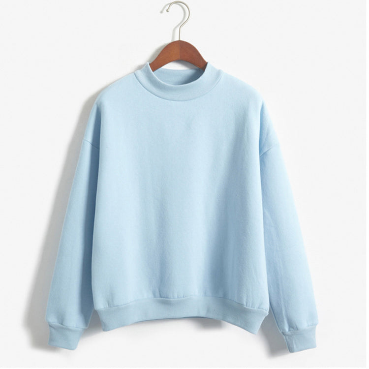 a blue sweater on a swinger