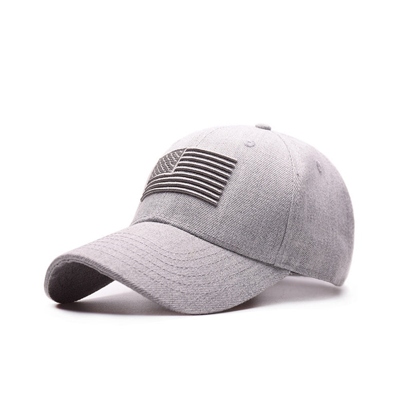 a grey hat with a flag patch