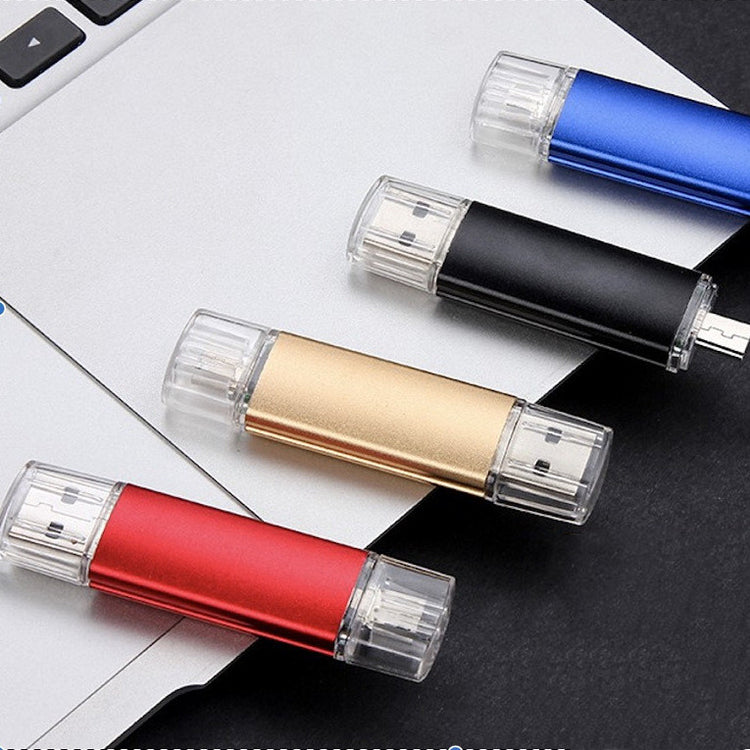 several usb drives on a laptop