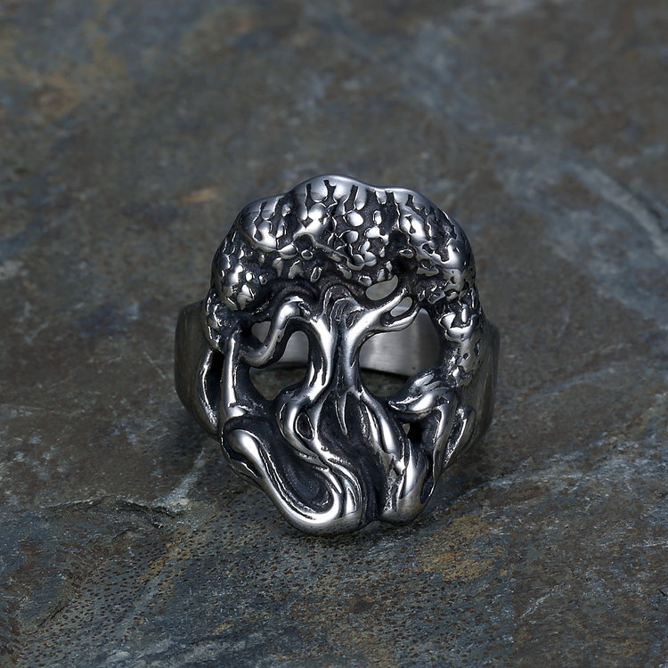 a silver ring with an octopus design