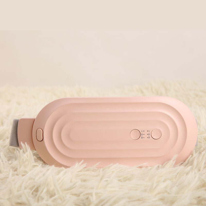 a pink device on a white carpet