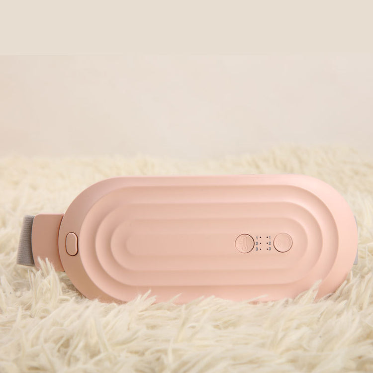 a pink device on a white carpet