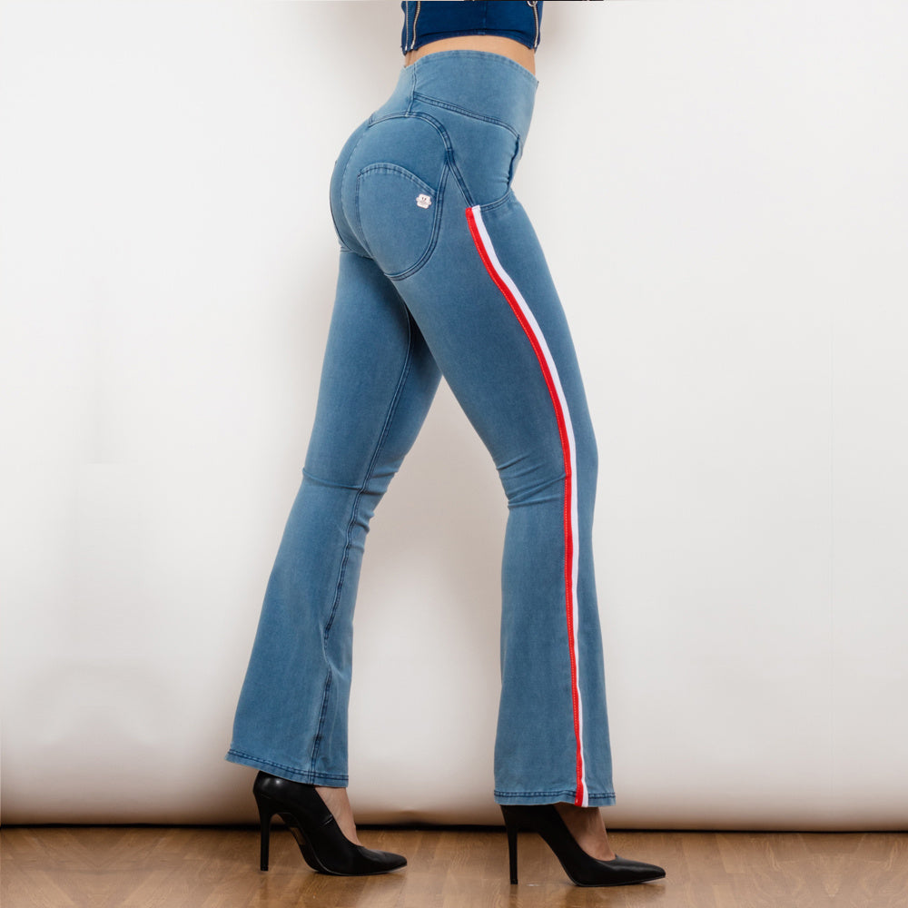 a woman wearing blue jeans