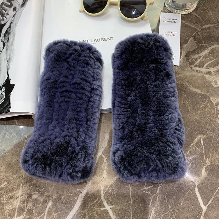 a pair of fur cases on a marble surface