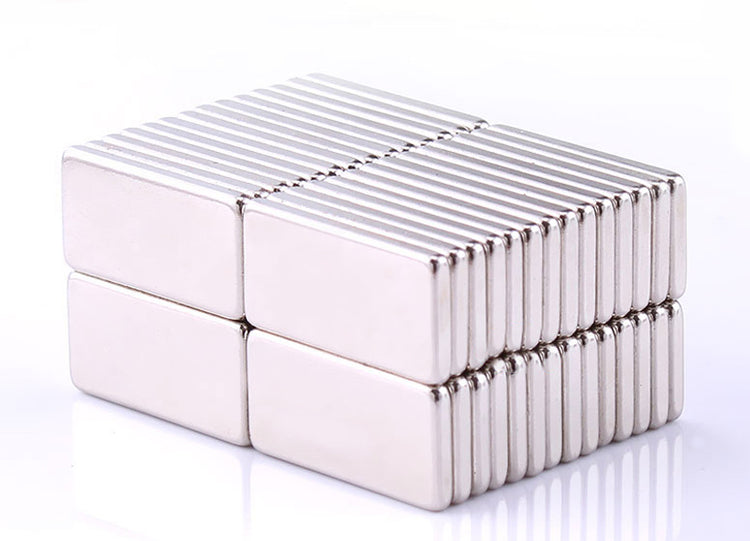 a stack of silver rectangular objects