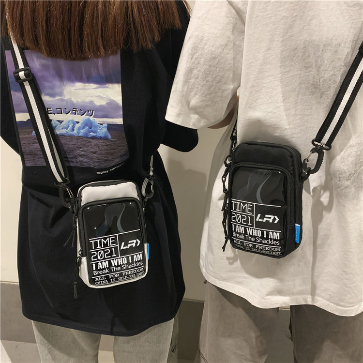 two people wearing black and white bags