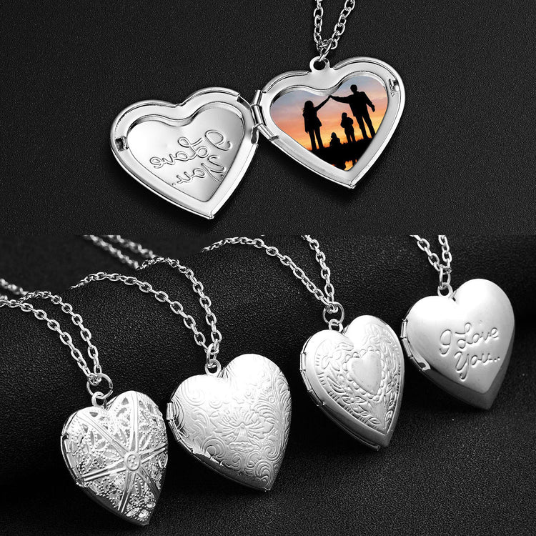a group of silver heart shaped necklaces